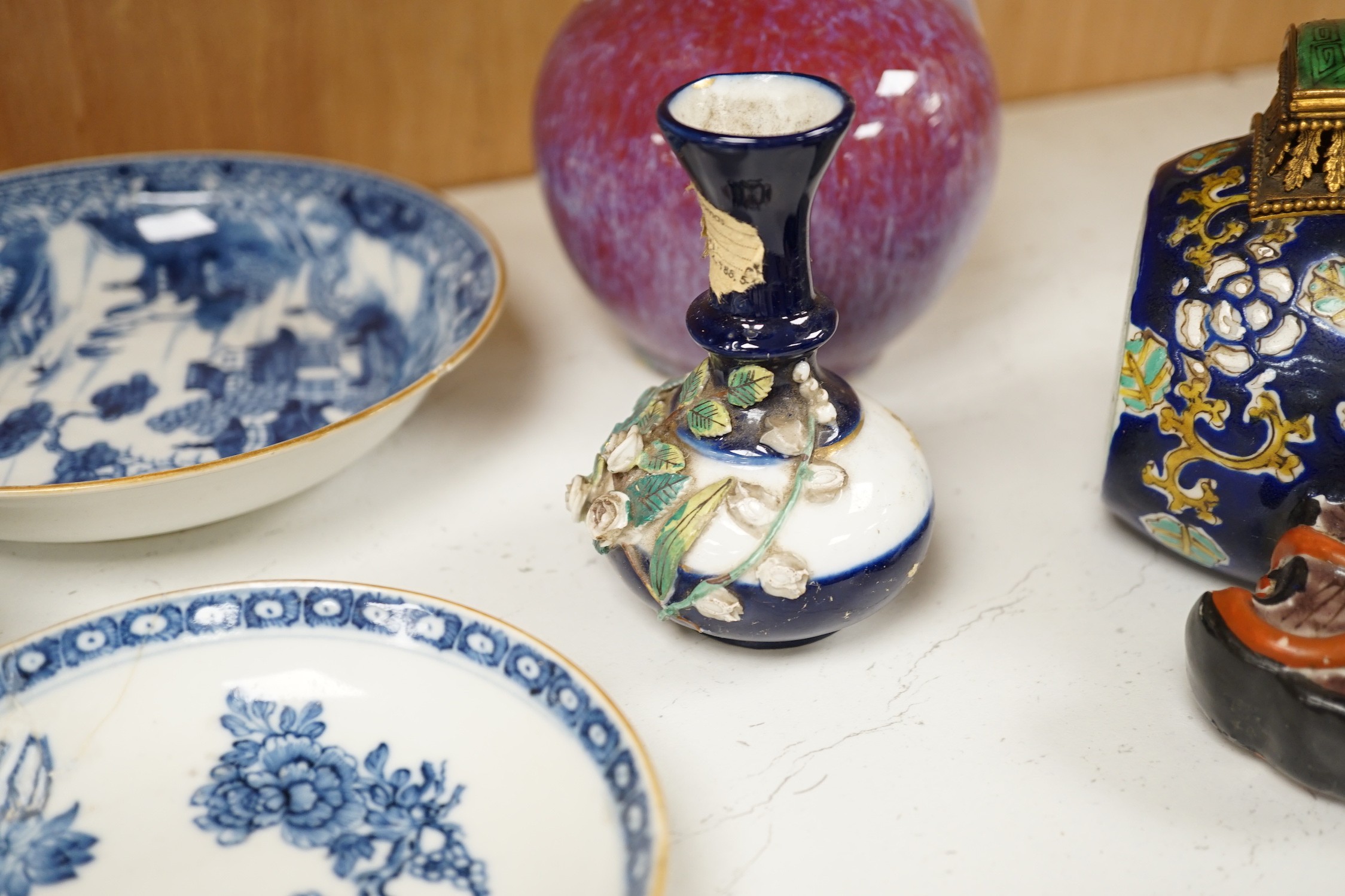 A group of Chinese and Japanese ceramics. Tallest 18cm